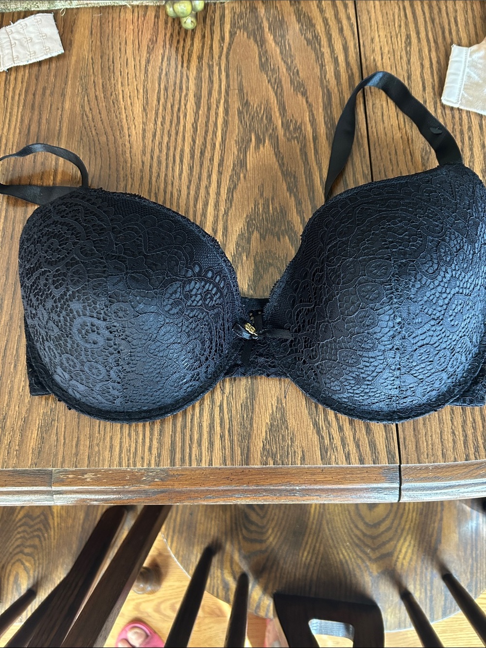 2 Vanity Fair tan and one black Daisy bras